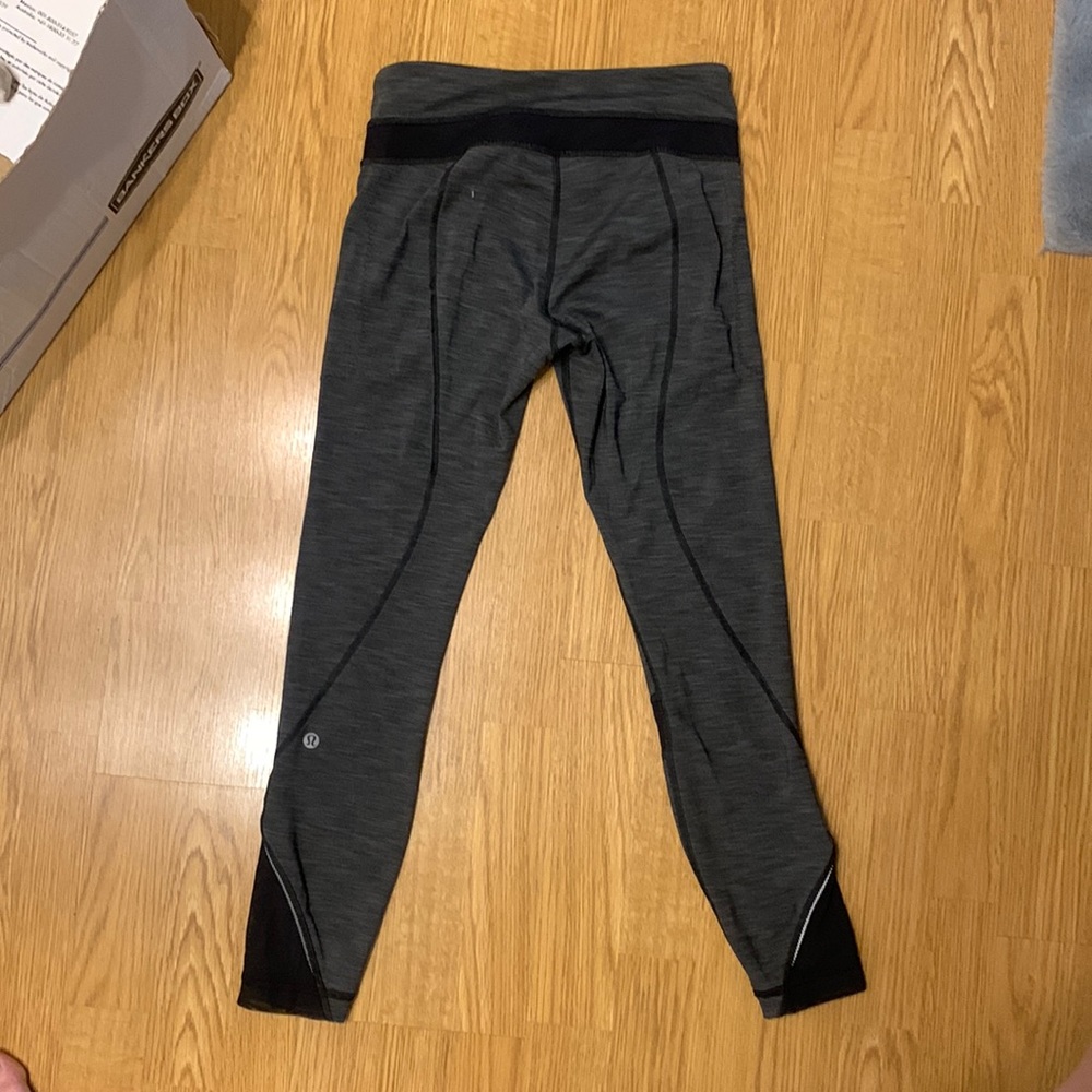 Lulu lemon 3/4 length. Super flattering, charcoal grey.